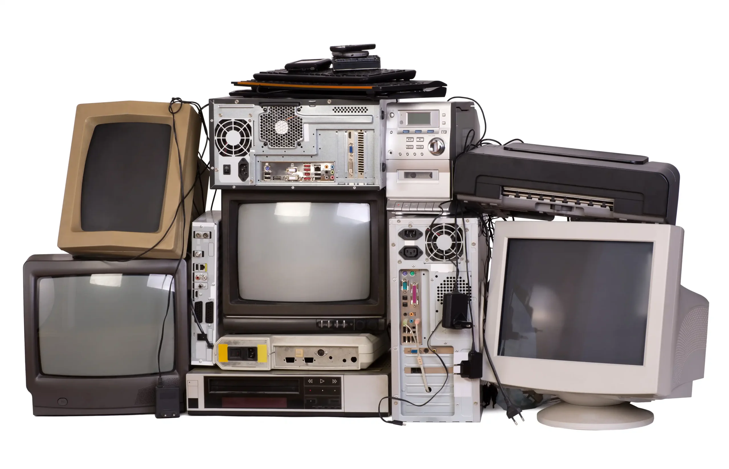 A pile of old technology including monitors, towers, etc.